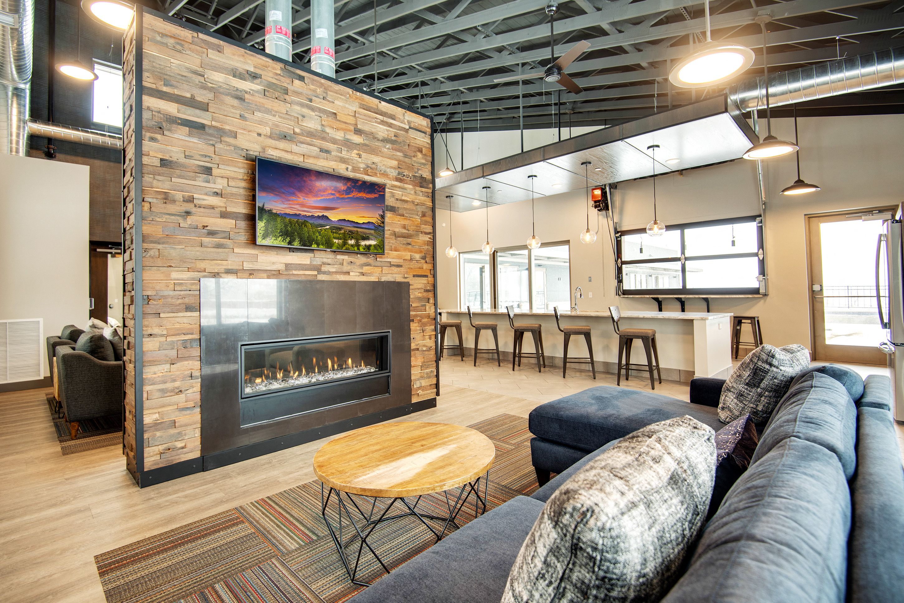 a living room with a fireplace and a couch