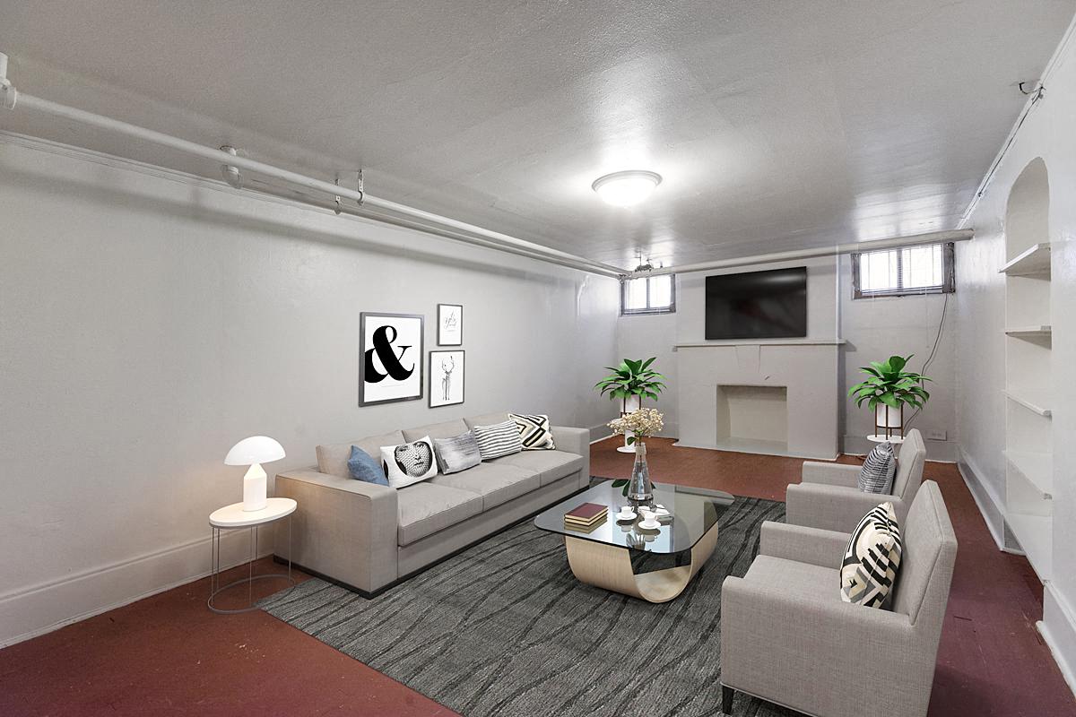 a living room with two couches and a fireplace