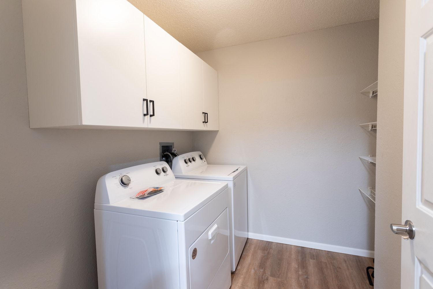 the preserve at ballantyne commons laundry room with washer and dryer
