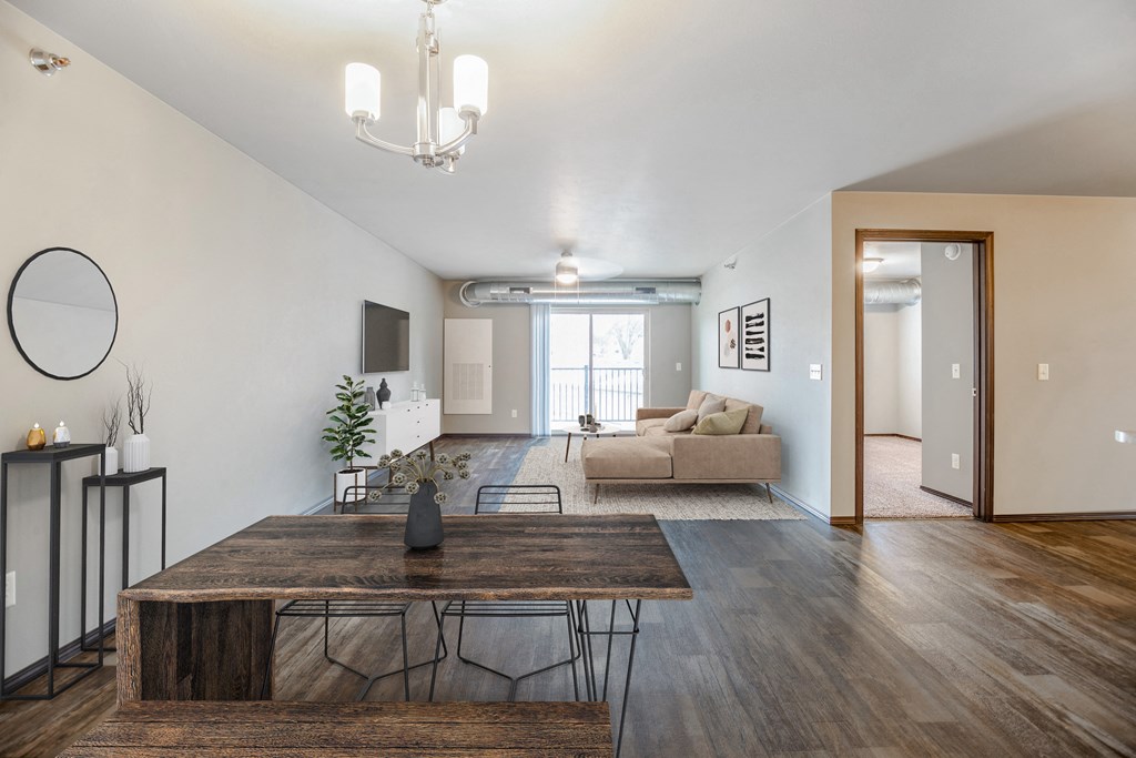 a living room with a couch and a table and a tv