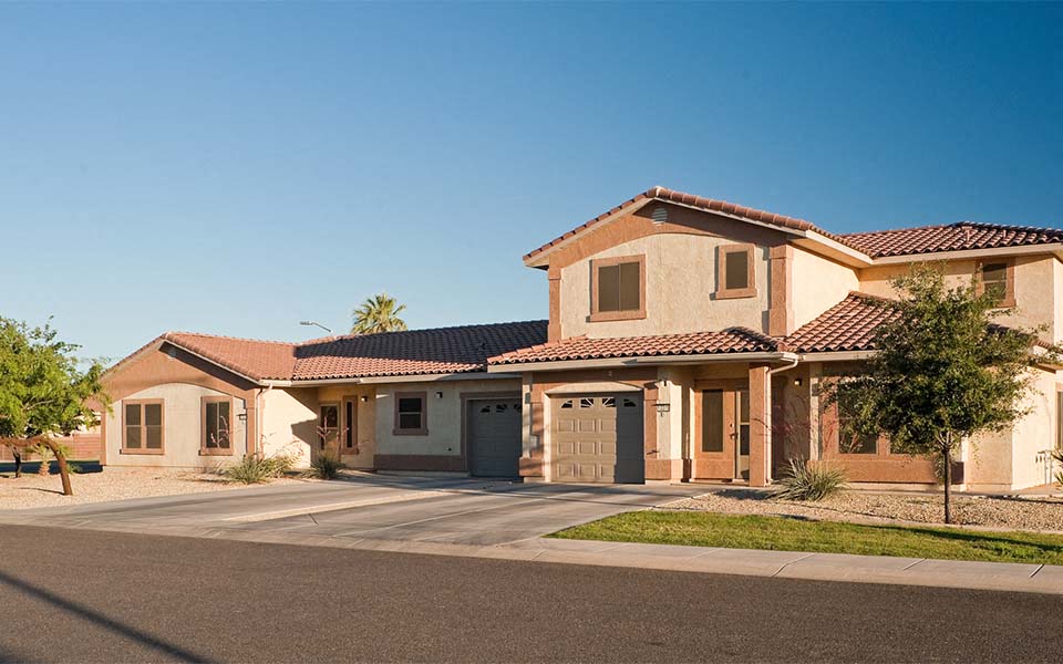 a house with a street in front of it