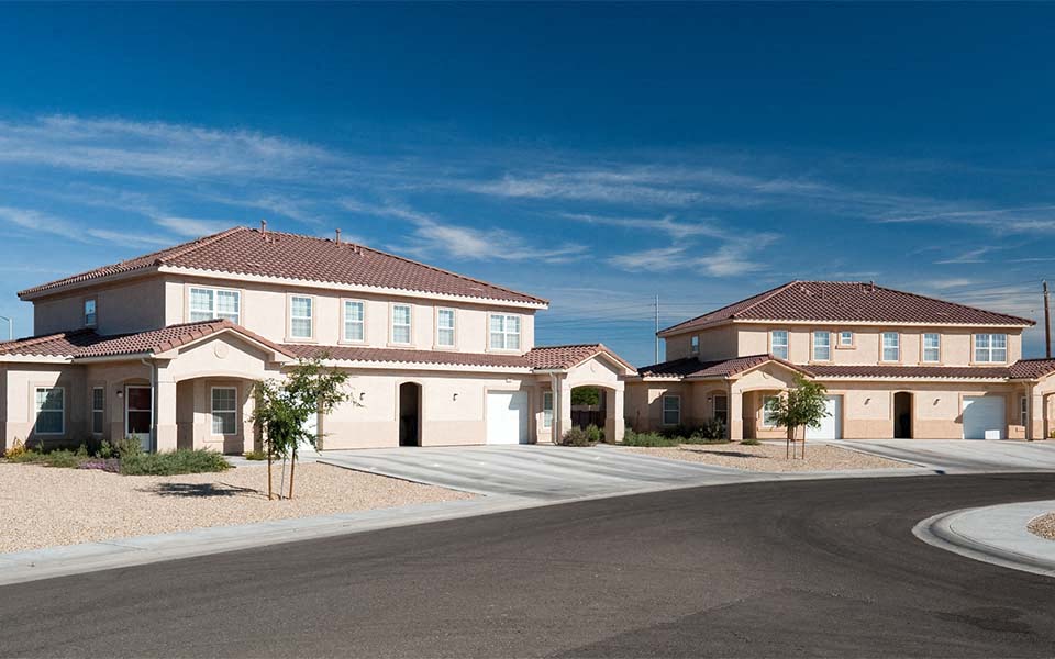 a street in front of some houses