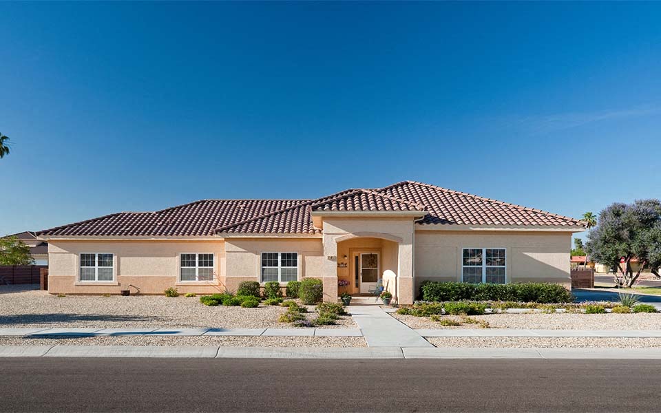 a house with a front porch and a driveway
