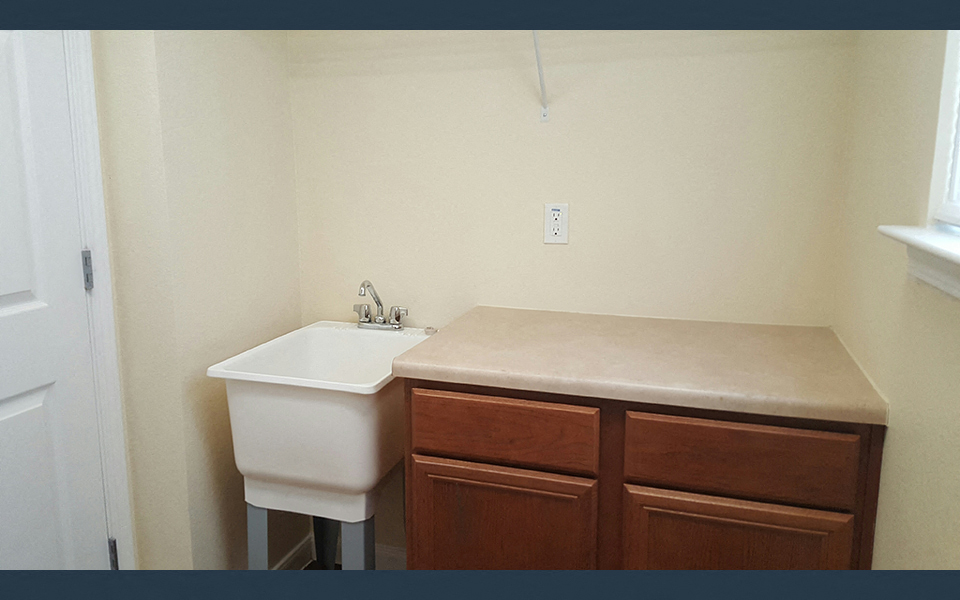 a small bathroom with a sink and a counter