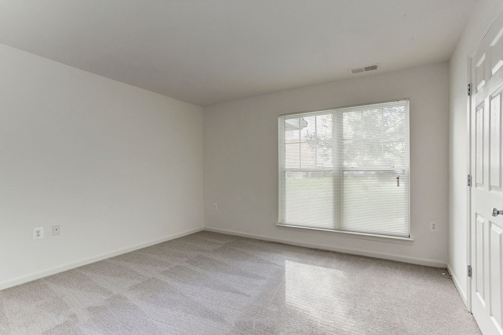 Contemporary Finishes Include Wood And Tile Flooring at County Center Crossing, Woodbridge, Virginia