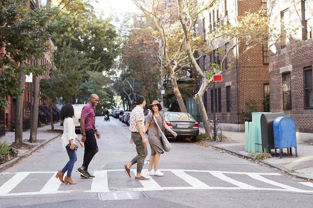 group-of-friends-crossing-urban-street-in-new-york-PSTBEL6-min at Fairmont  Apartments, Washington, DC, 20009
