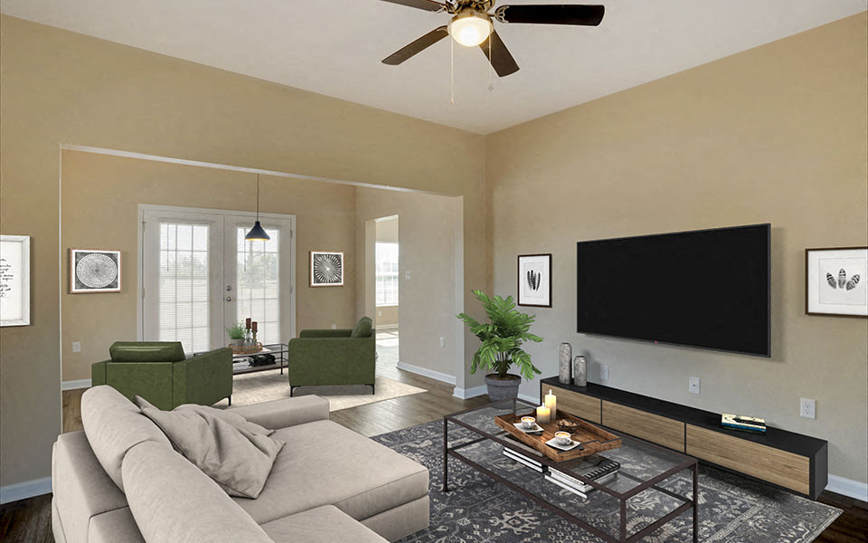 a living room with a couch and a tv