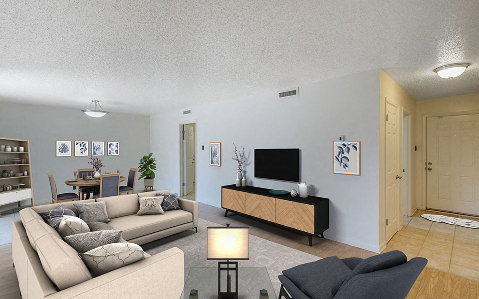 a living room with a couch and a tv