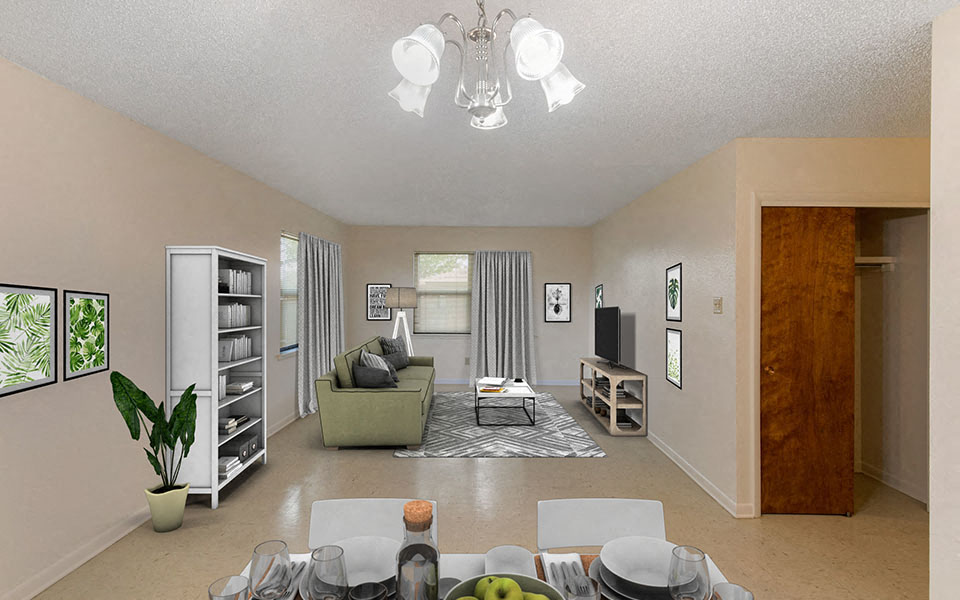 a living room with a couch and a table