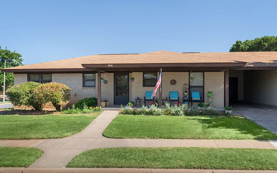 a house with an flag in front of it