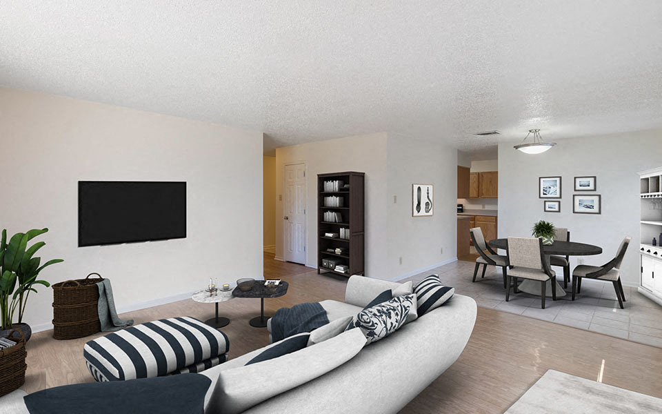 a living room with a couch and a tv