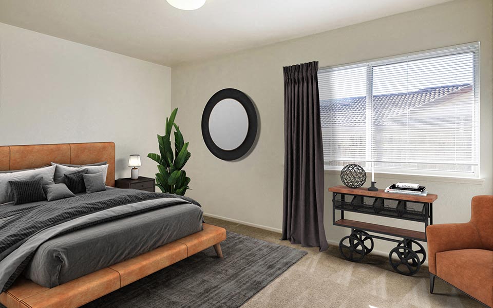 a bedroom with a bed and a window