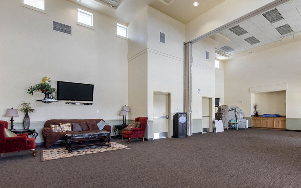 a living room with a couch and a television
