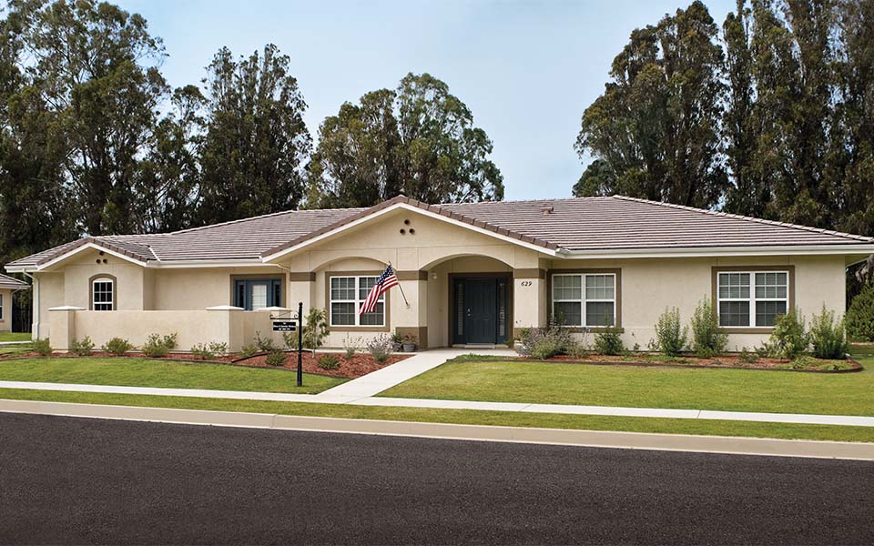 a house with an flag on the front of it