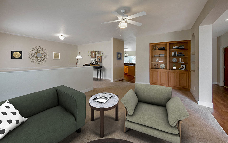 a living room with two couches and a table