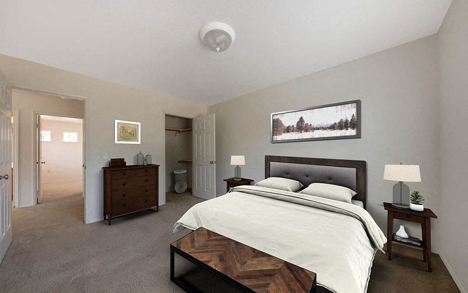 a bedroom with a bed and a closet