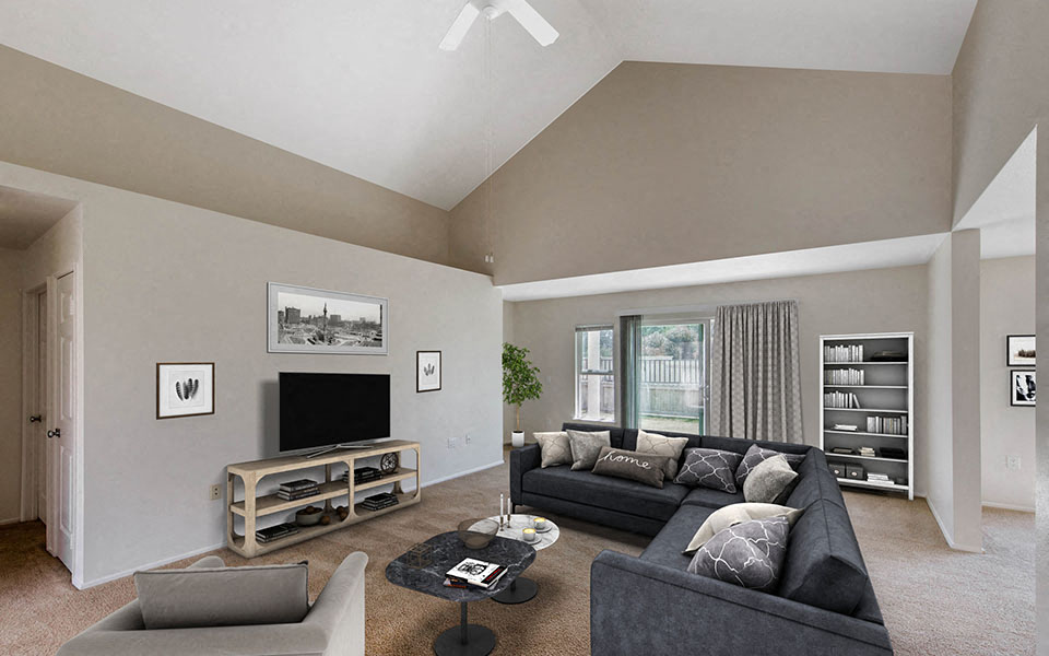 a living room with a couch and a tv