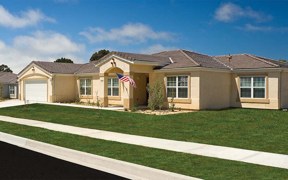 a house with an flag in the front of it