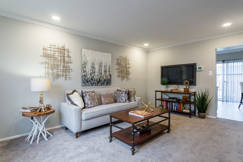 a living room with a couch and a coffee table