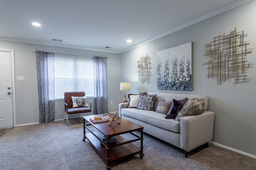 a living room with a couch and a coffee table