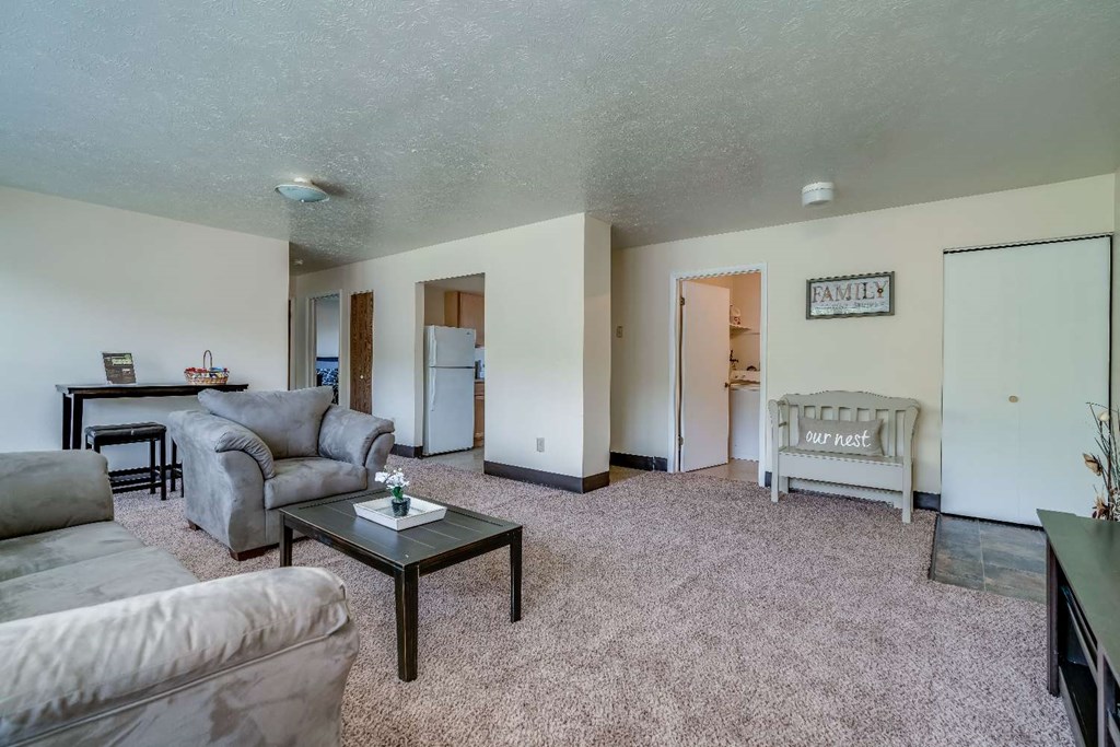 a living room with a couch and a coffee table