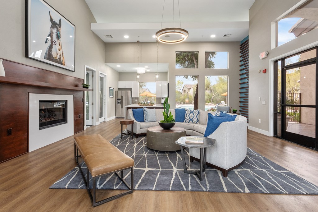 a living room with couches and a fireplace