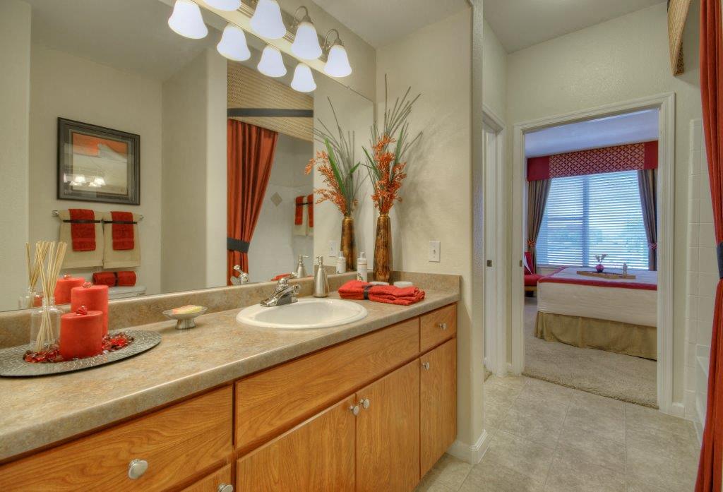 Vue Park West bathroom large vanity with door attaching bathroom to the bedroom