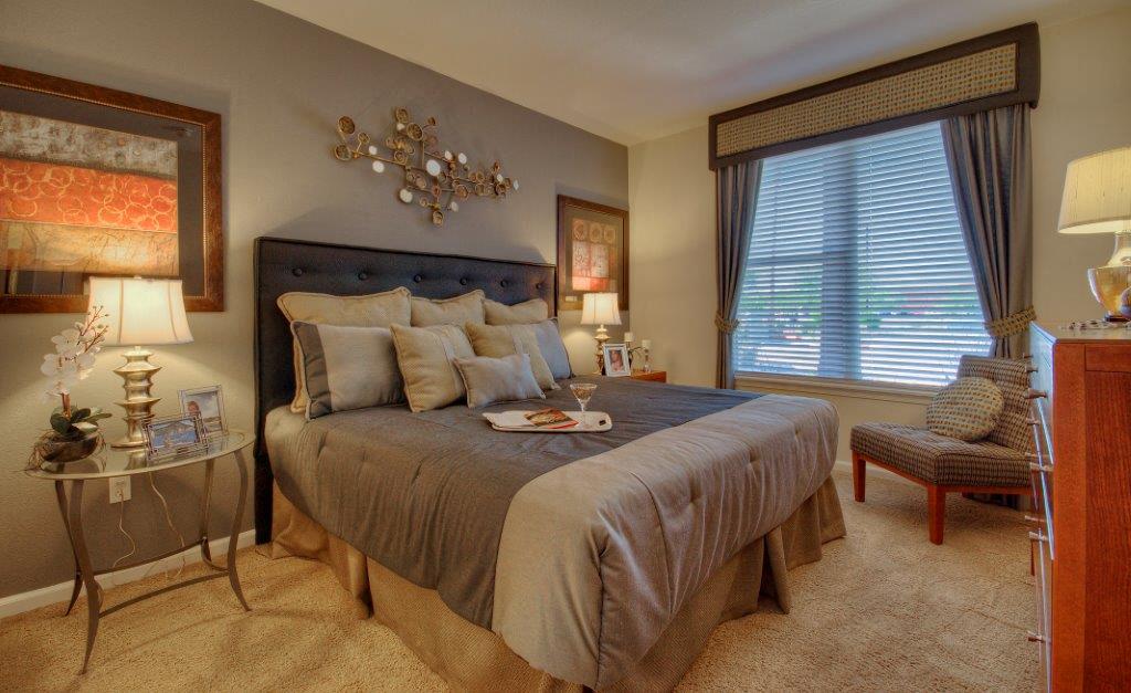 Vue Park West bedroom with king sized bed and wall to wall carpet