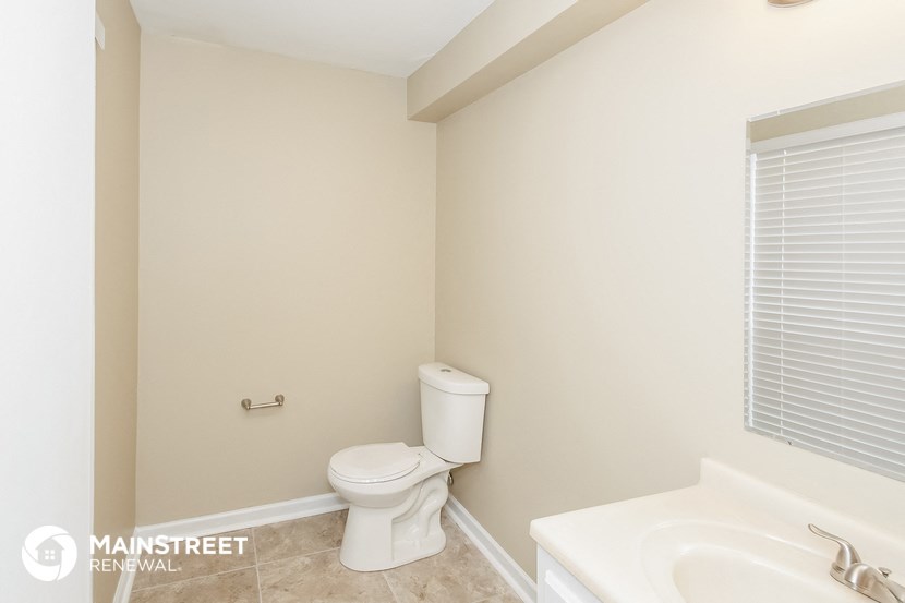 a small bathroom with a toilet and a sink