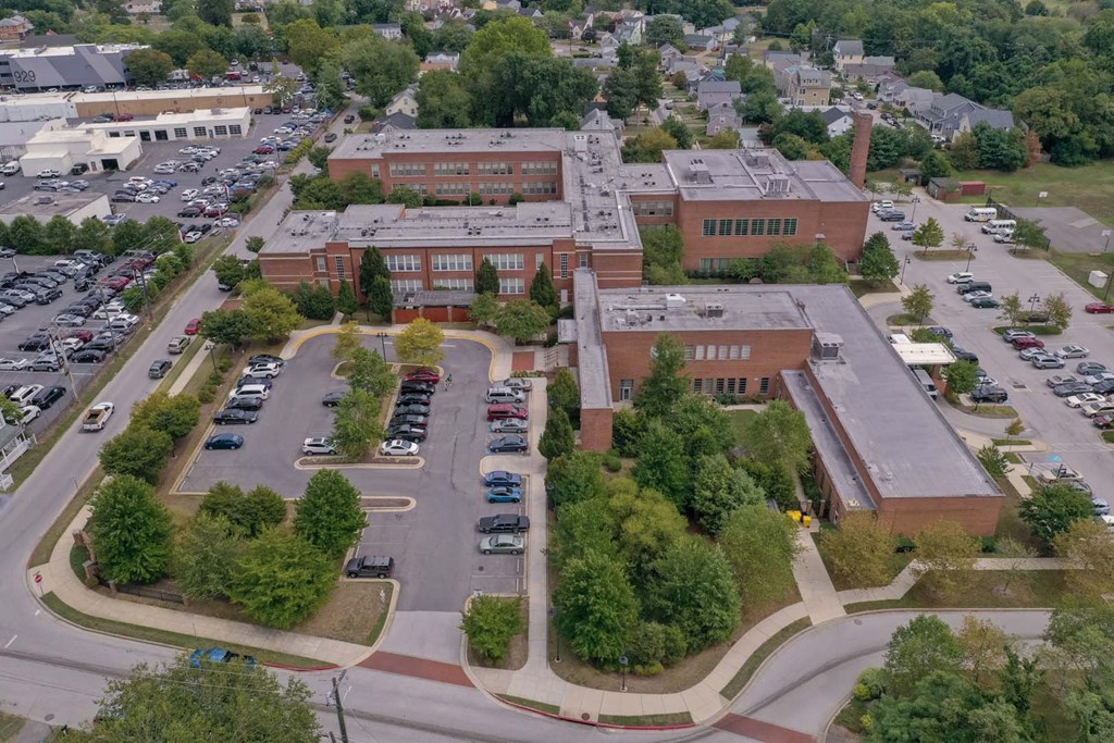 an aerial view of the parking lot of the campus