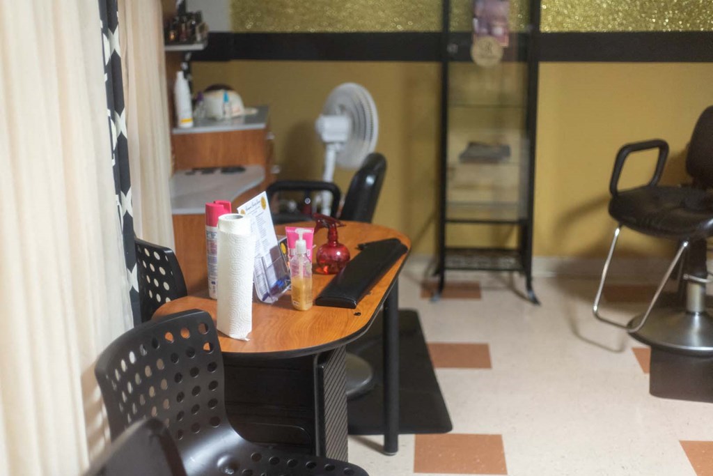a dining room table in a restaurant with chairs