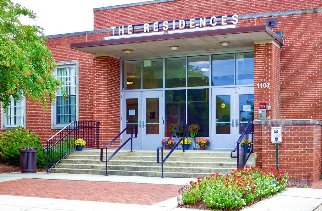 the front of a building with stairs