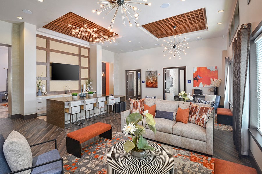 a living room with a couch and a table