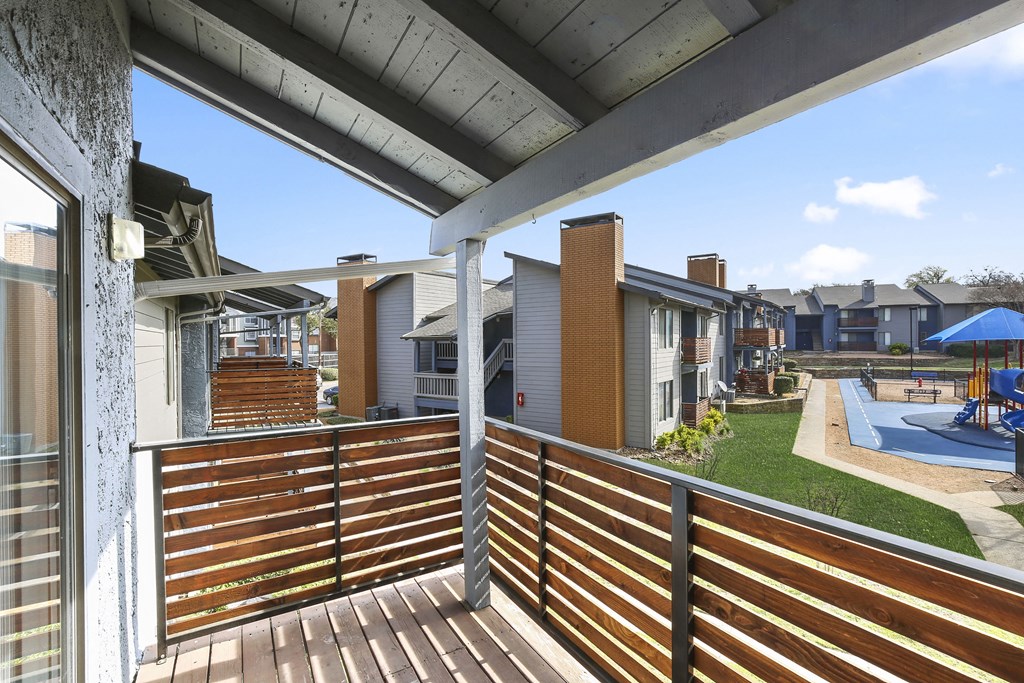 the view from the deck of a home with a pool