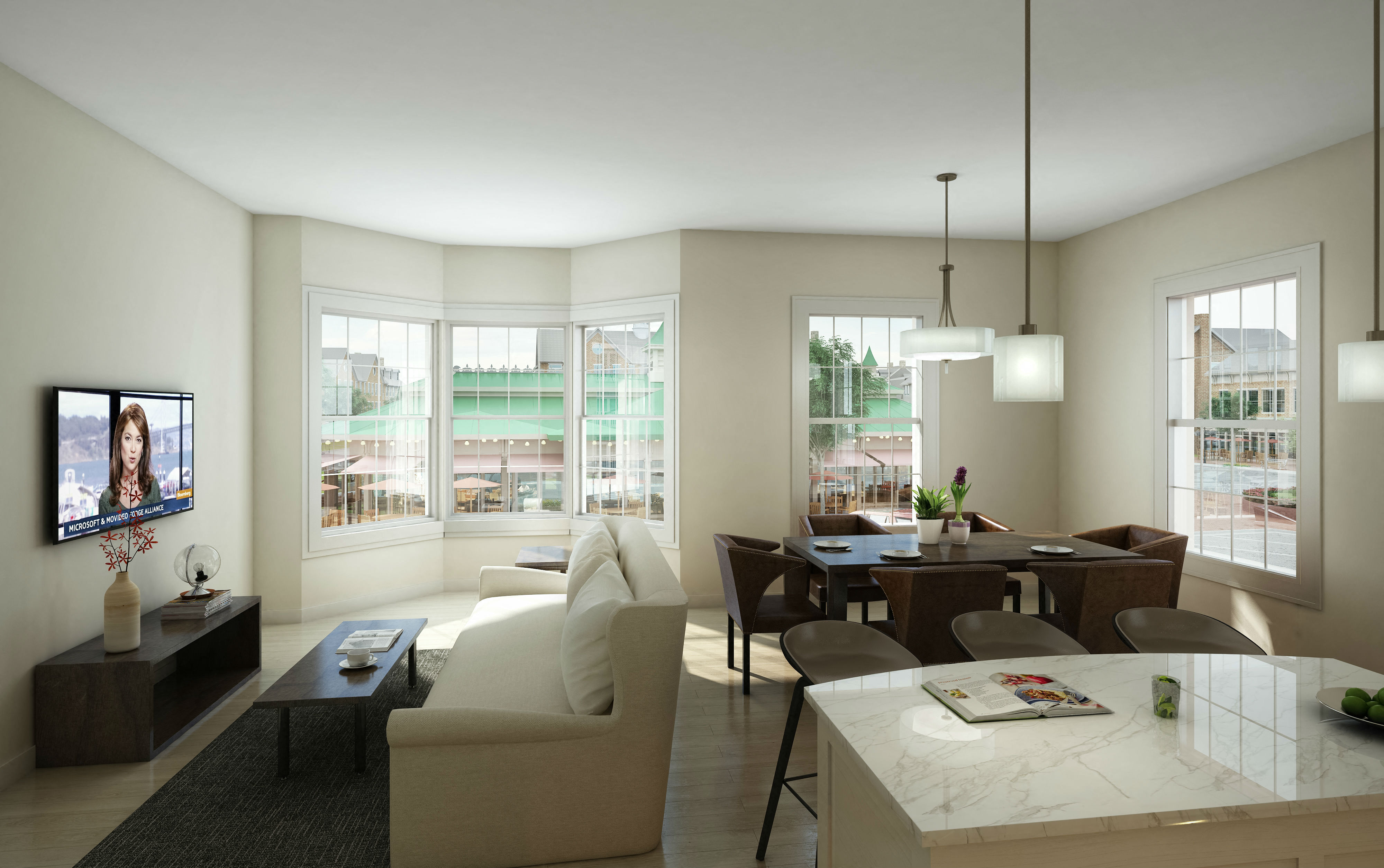 A living room with a white couch and a coffee table.