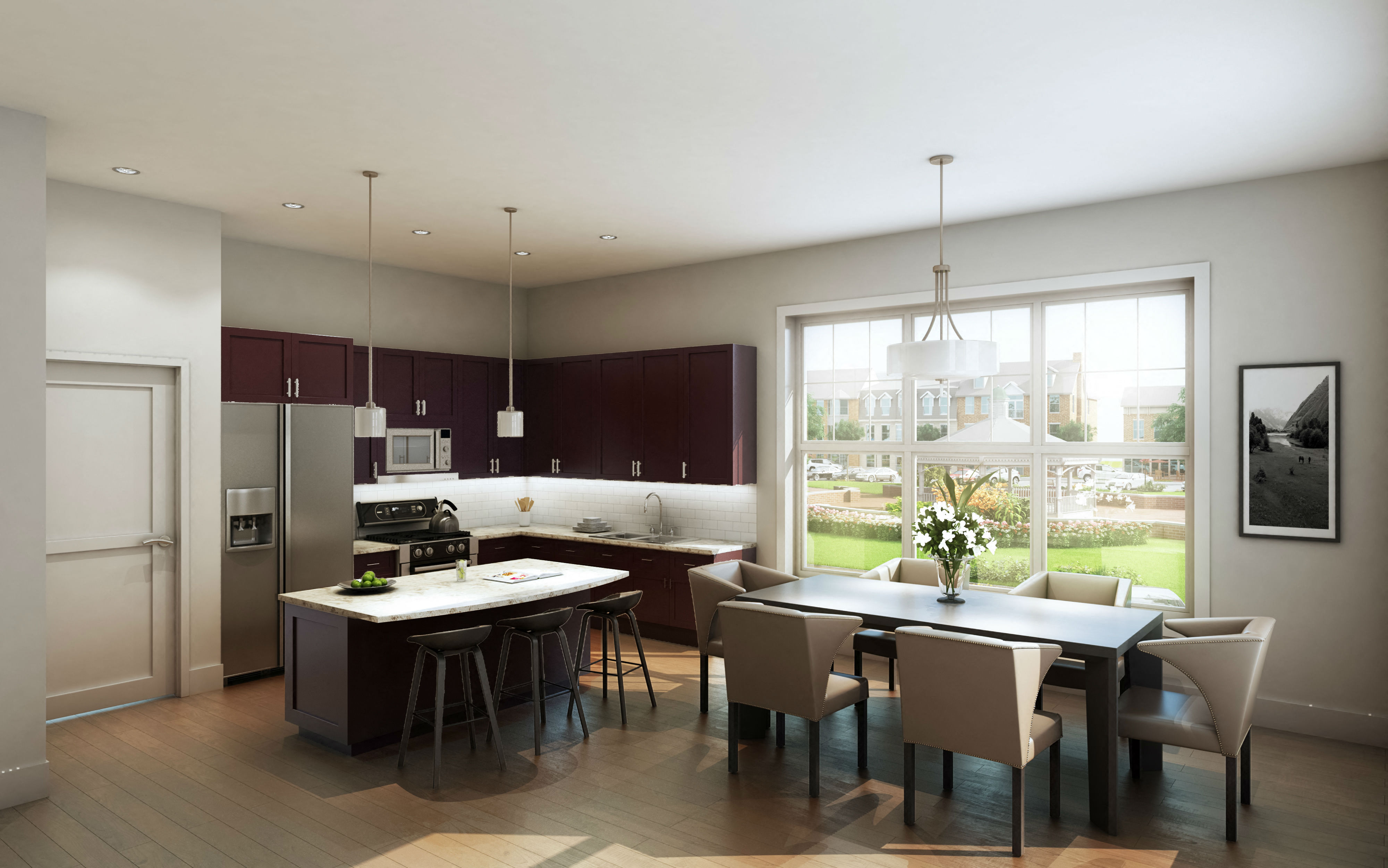 A modern kitchen with a dining table and chairs.