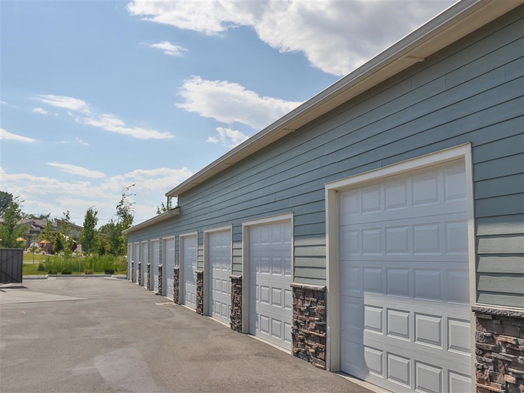 a row of garage doors on the side of a building