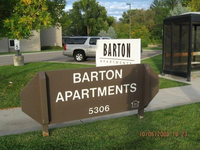 a sign on the side of the street