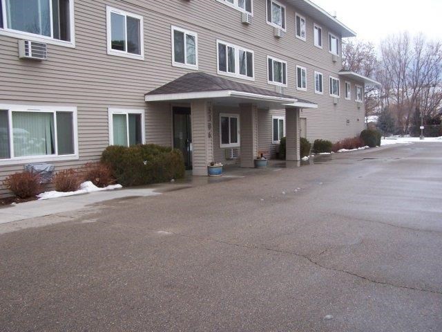 a house with a driveway in front of it