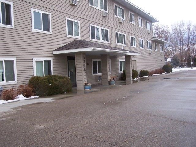 a house with a driveway in front of it