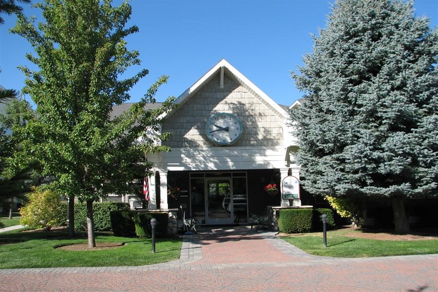 a church with a clock on the front of it