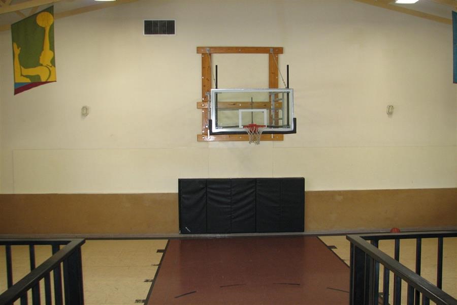 a room with a table and a window on the wall