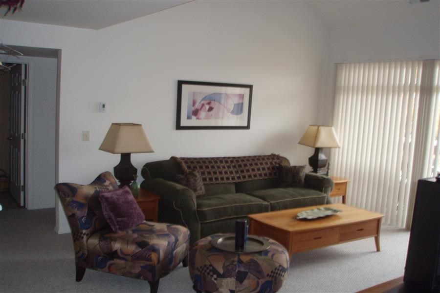 a living room with a couch and a coffee table