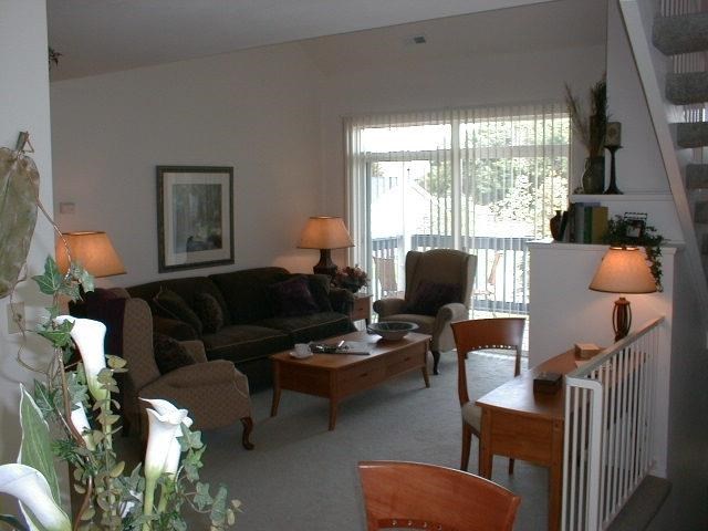 a living room with a couch and a table