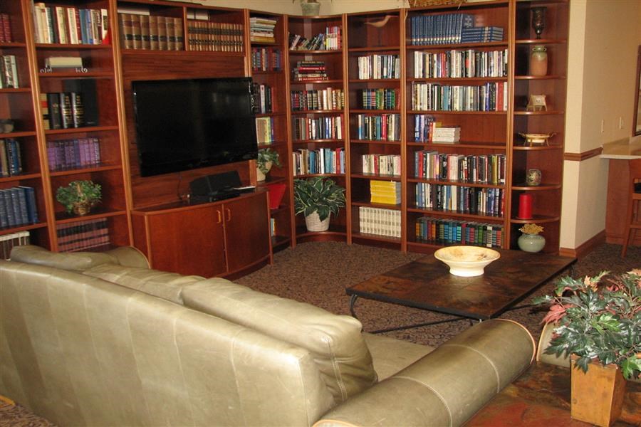 a living room with a couch and a tv