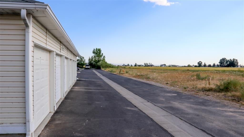 a white building on the side of a road