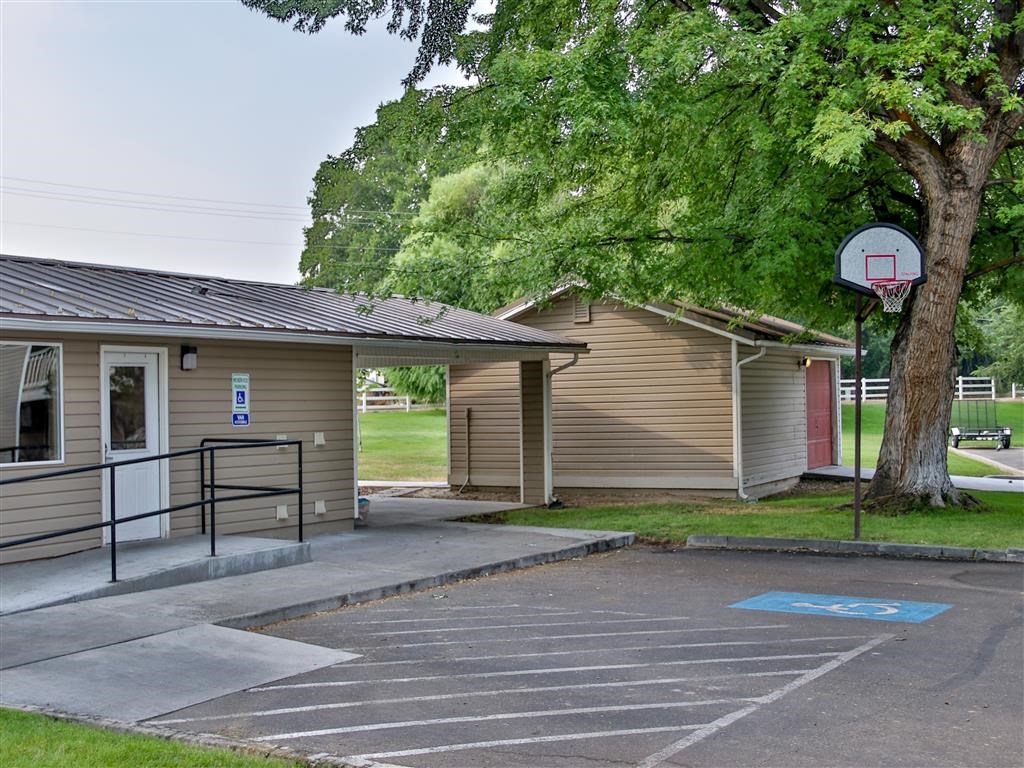 a basketball hoop in front of a building