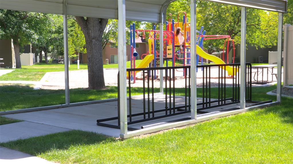 a playground in a pavilion in a park