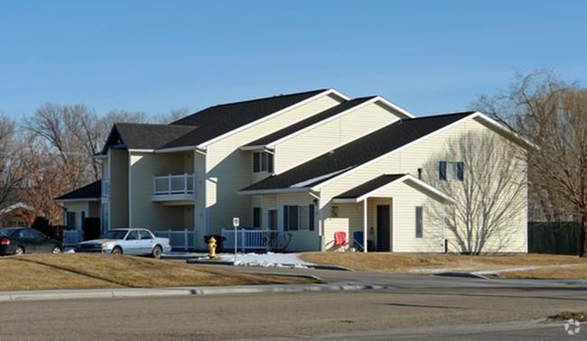 a house with a car parked in front of it