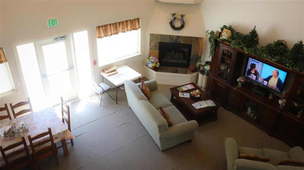 a living room with a couch and a tv